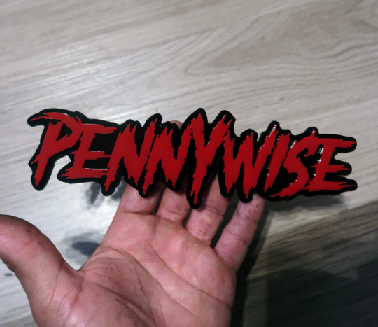 Pennywise car badge. Includes 1.