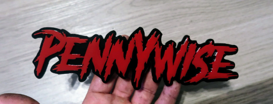 Pennywise car badge. Includes 1.