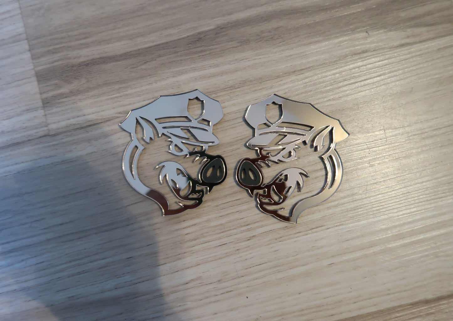 Pig fender badges. Includes 2