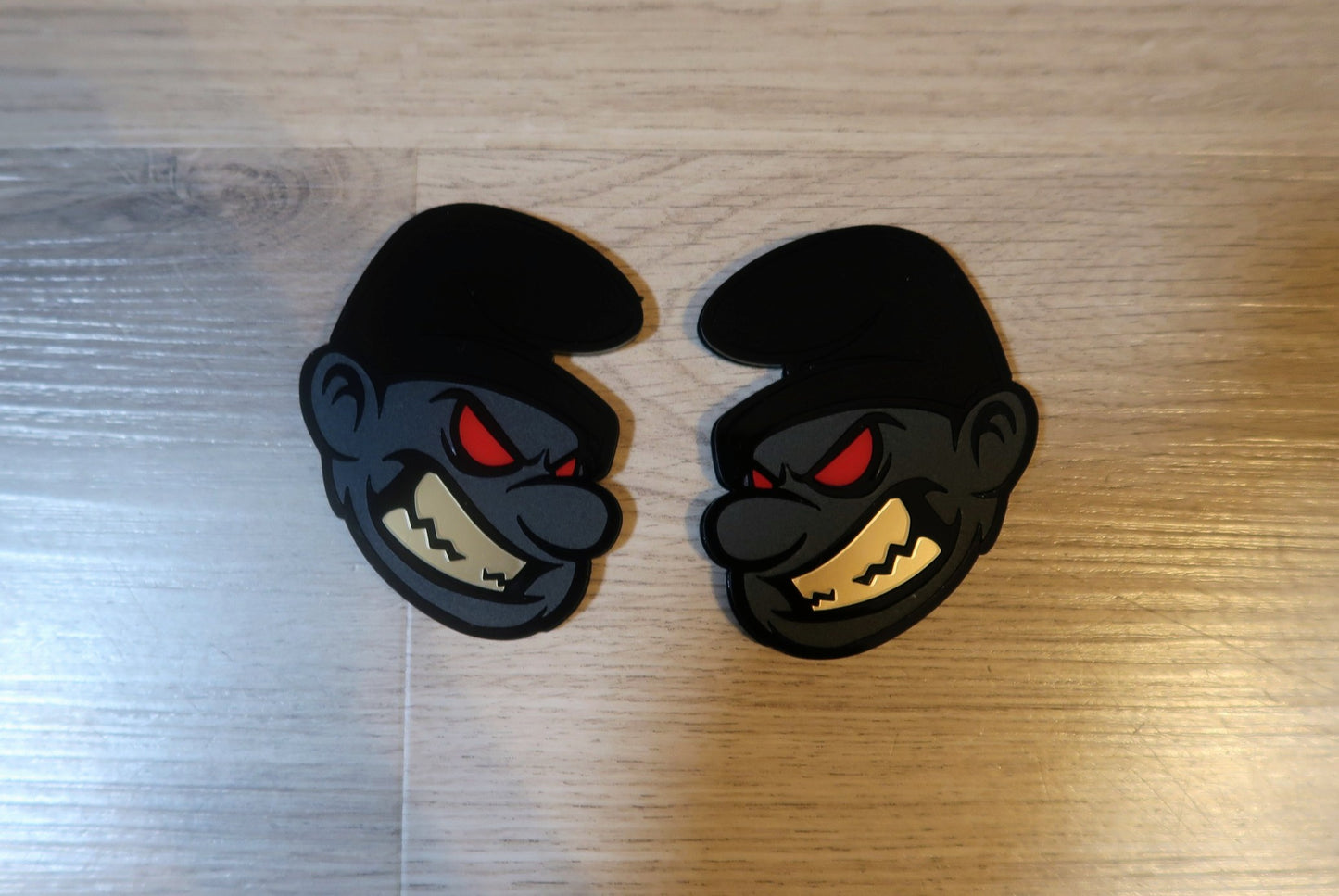 Possessed Smurf badges. Includes 2