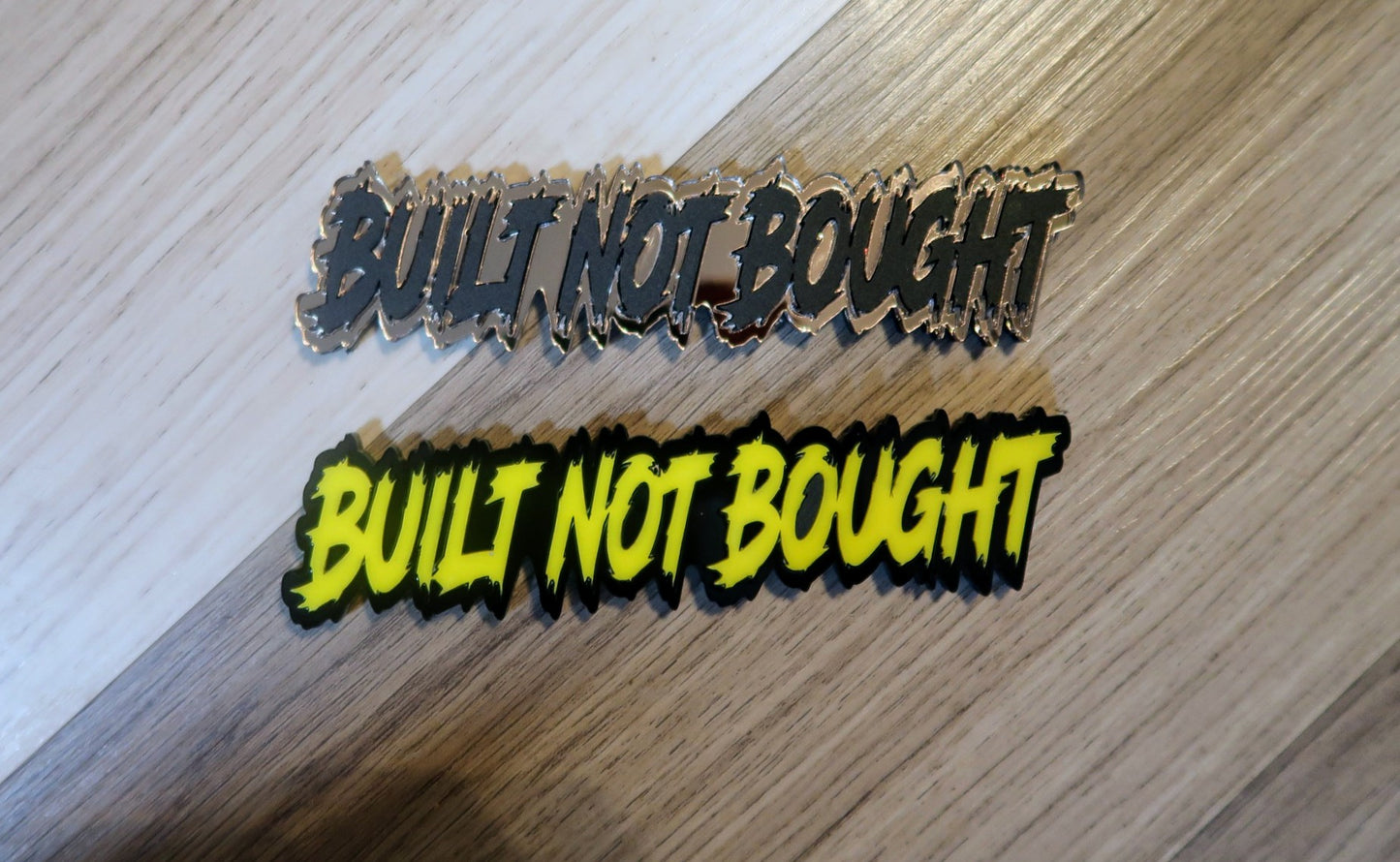 Built not bought car badge