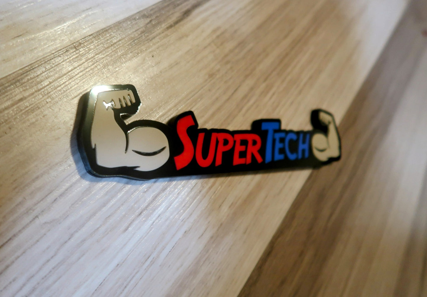 Super Tech badge. Includes 1