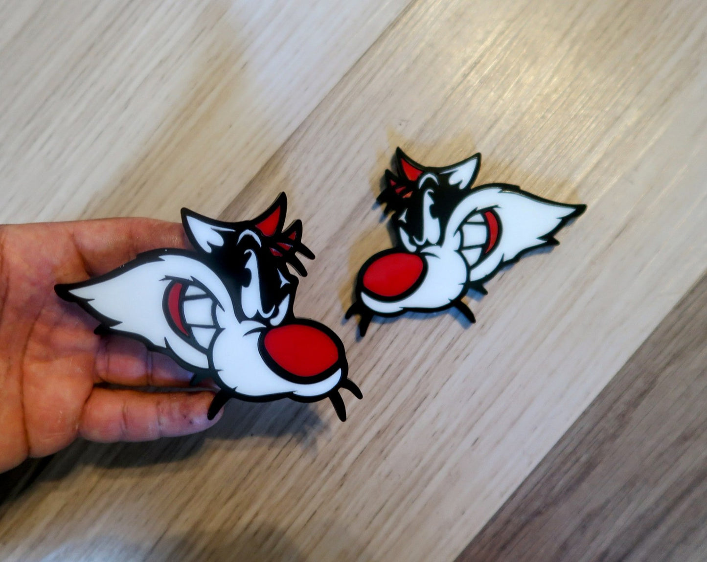 Sylvester Custom badges. Includes 2.