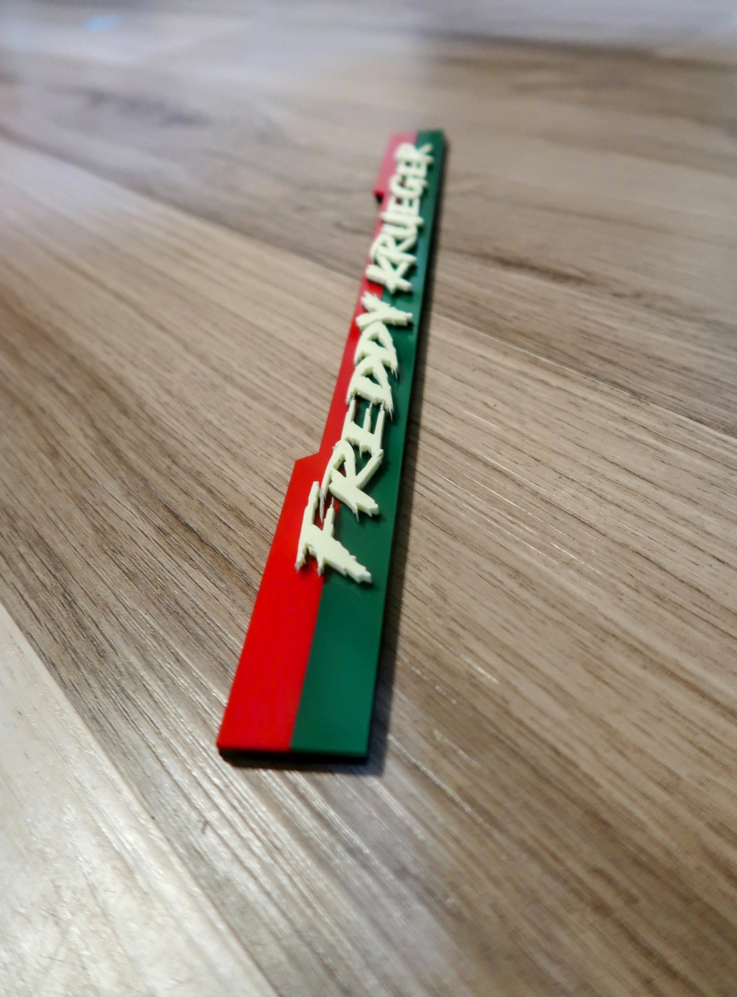 Custom Freddy Krueger badge.
