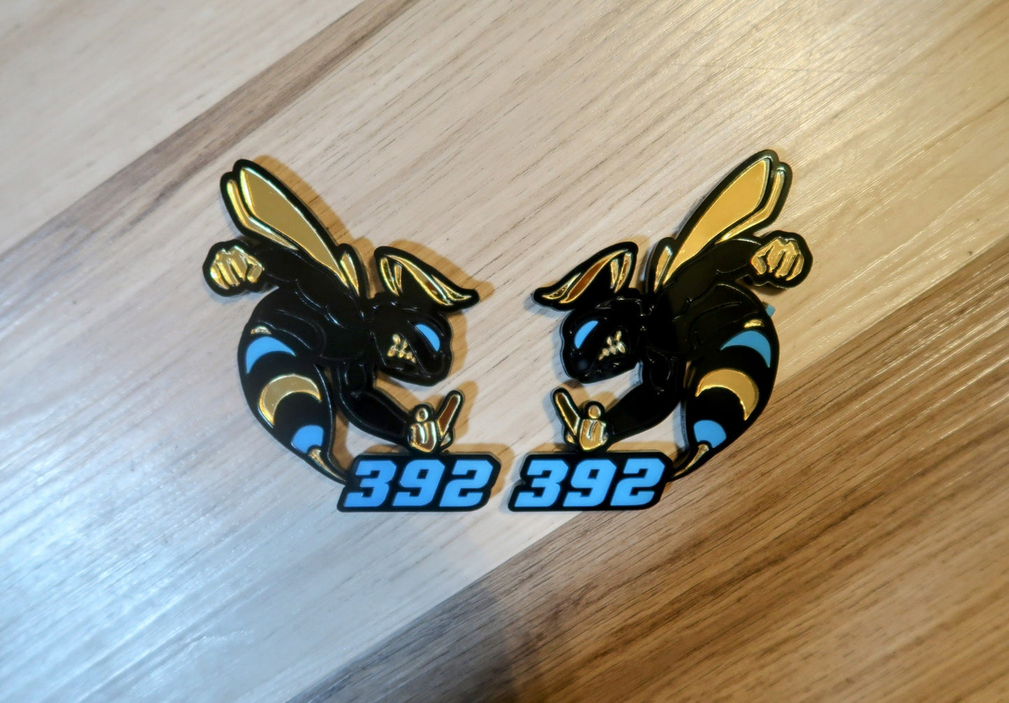 392 or 345 fender badges. Includes 2.