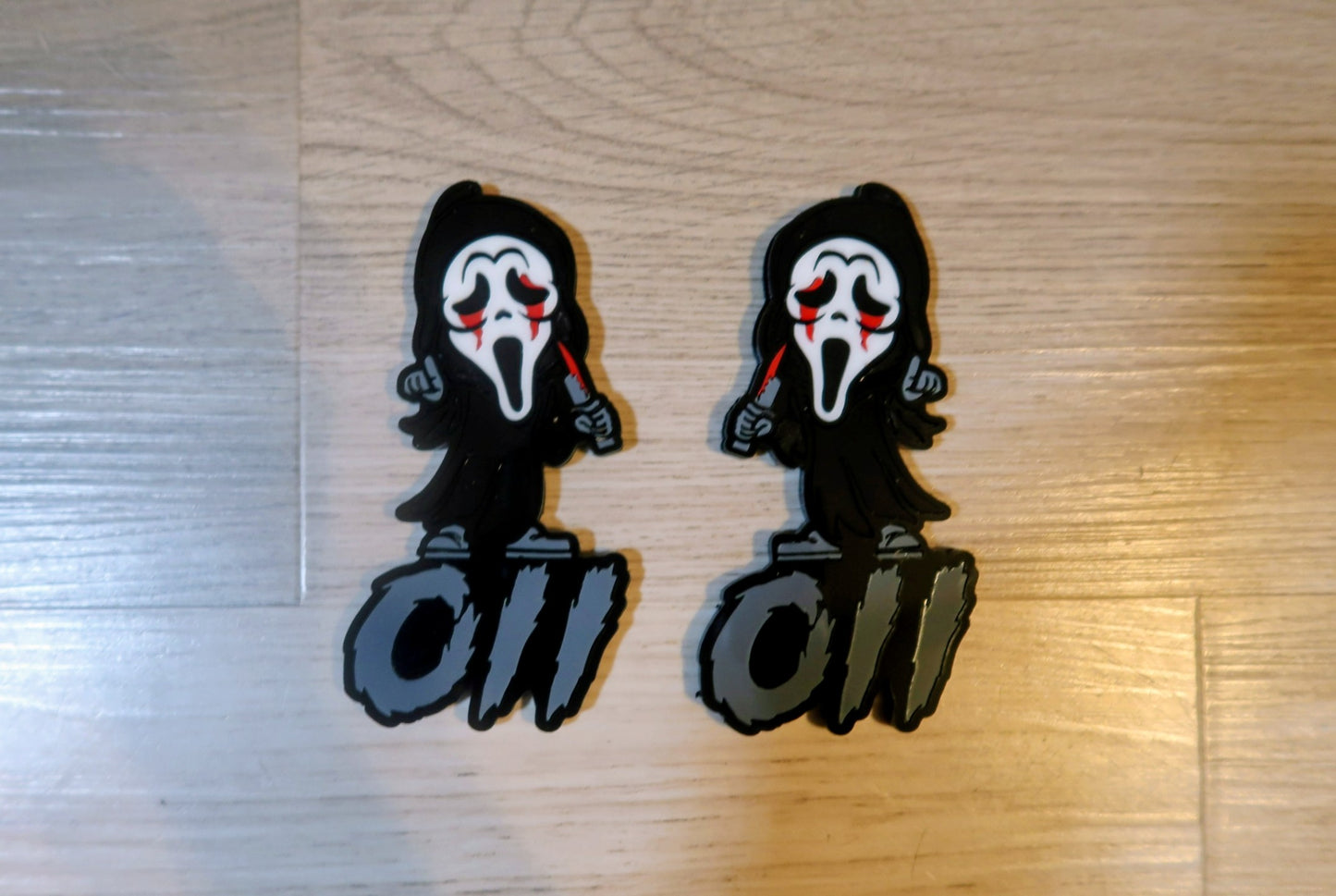 Mini Ghostface fender badges.