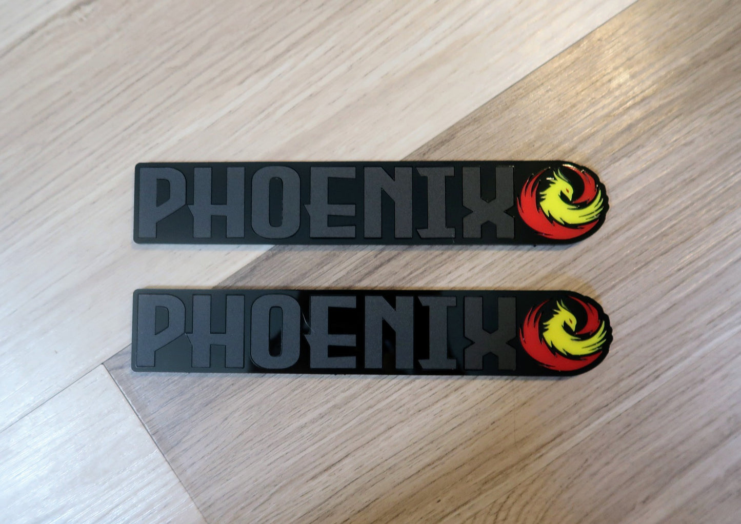 Phoenix badges. Includes 2