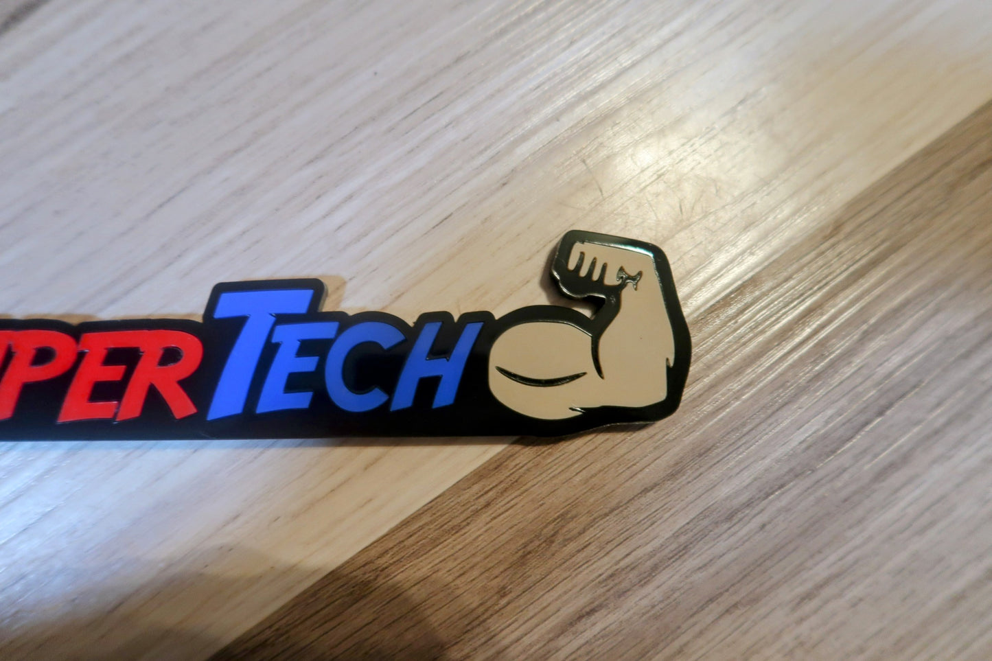 Super Tech badge. Includes 1