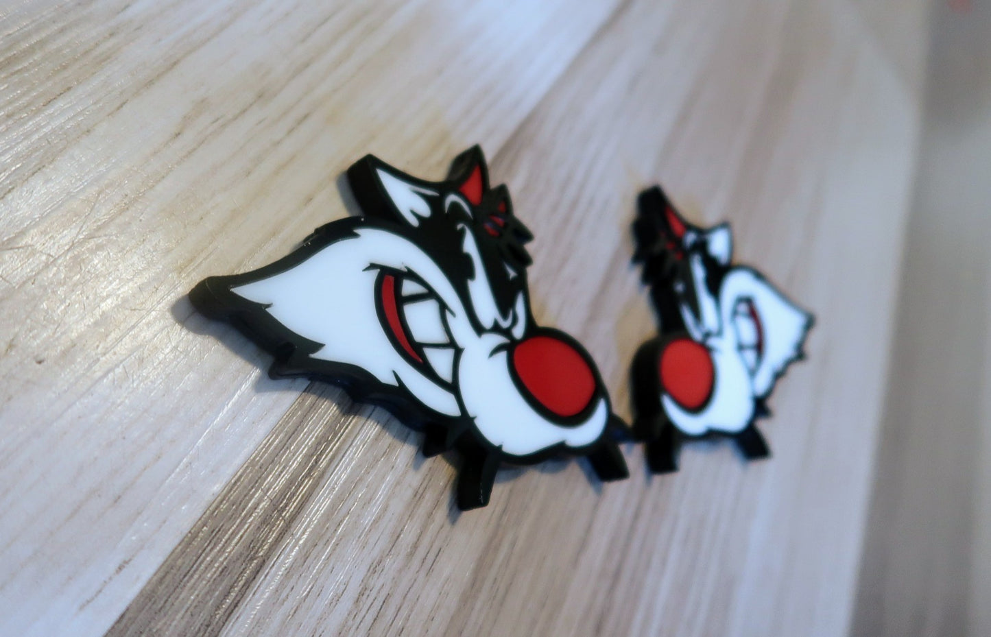 Sylvester Custom badges. Includes 2.