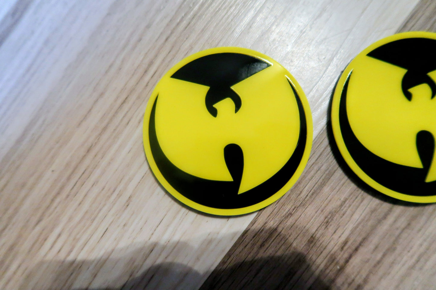 Inspired Wu Tang badges. Includes 2.