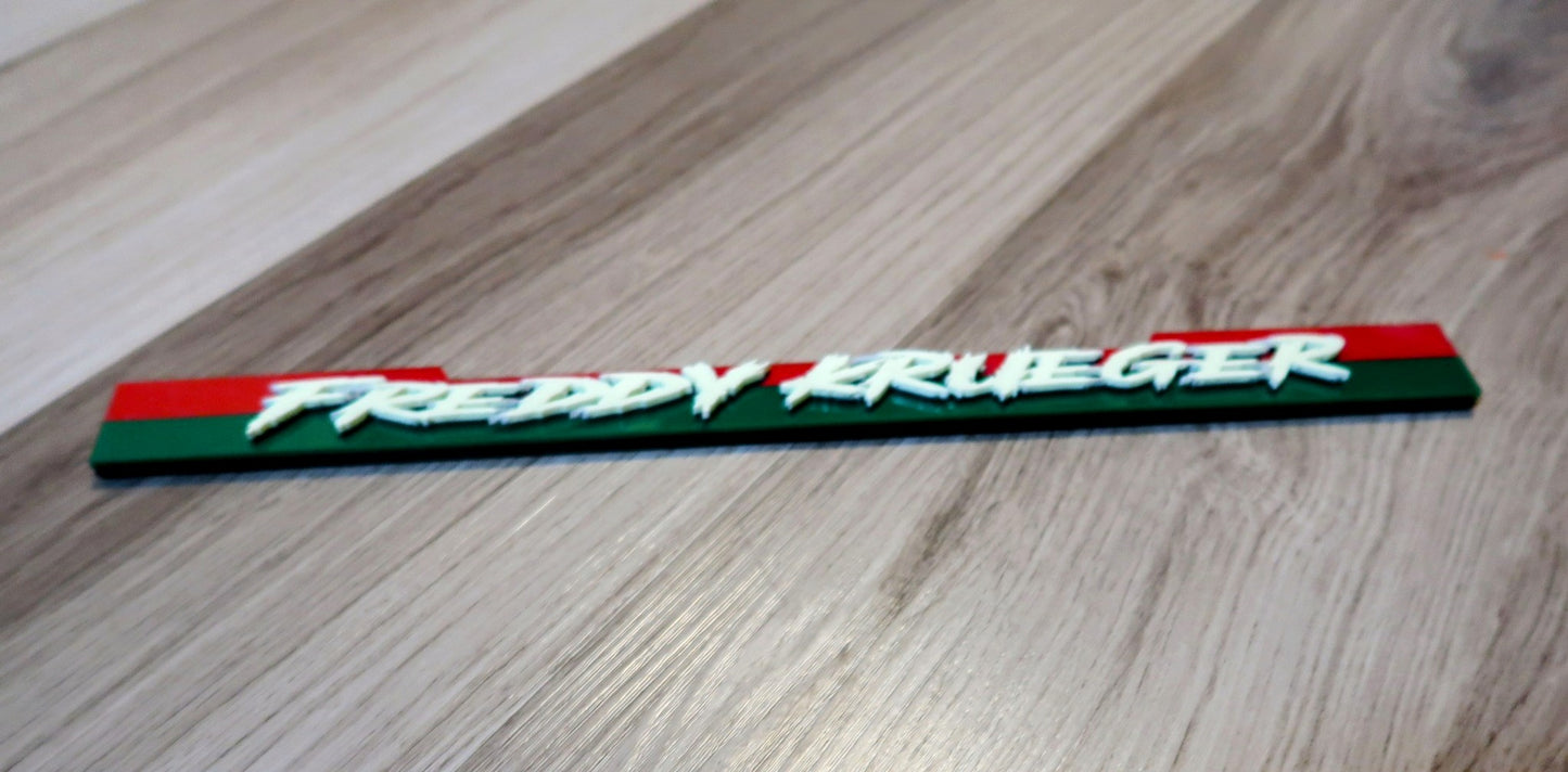 Custom Freddy Krueger badge.