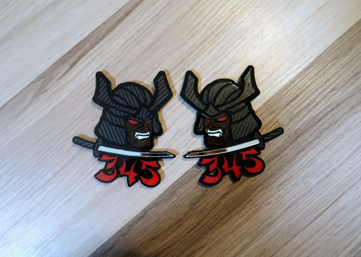 Samurai 345,392, 426 fender badges. Includes 2.