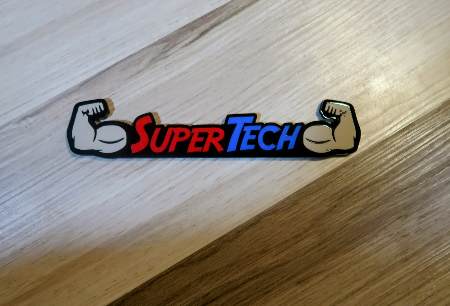 Super Tech badge. Includes 1