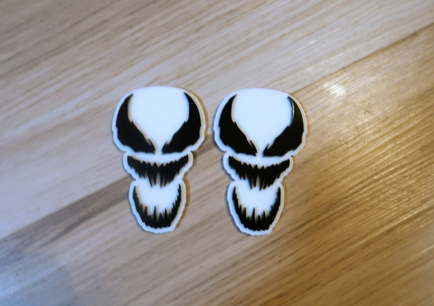 Inspired Carnage and Venom car badges. Includes 2.