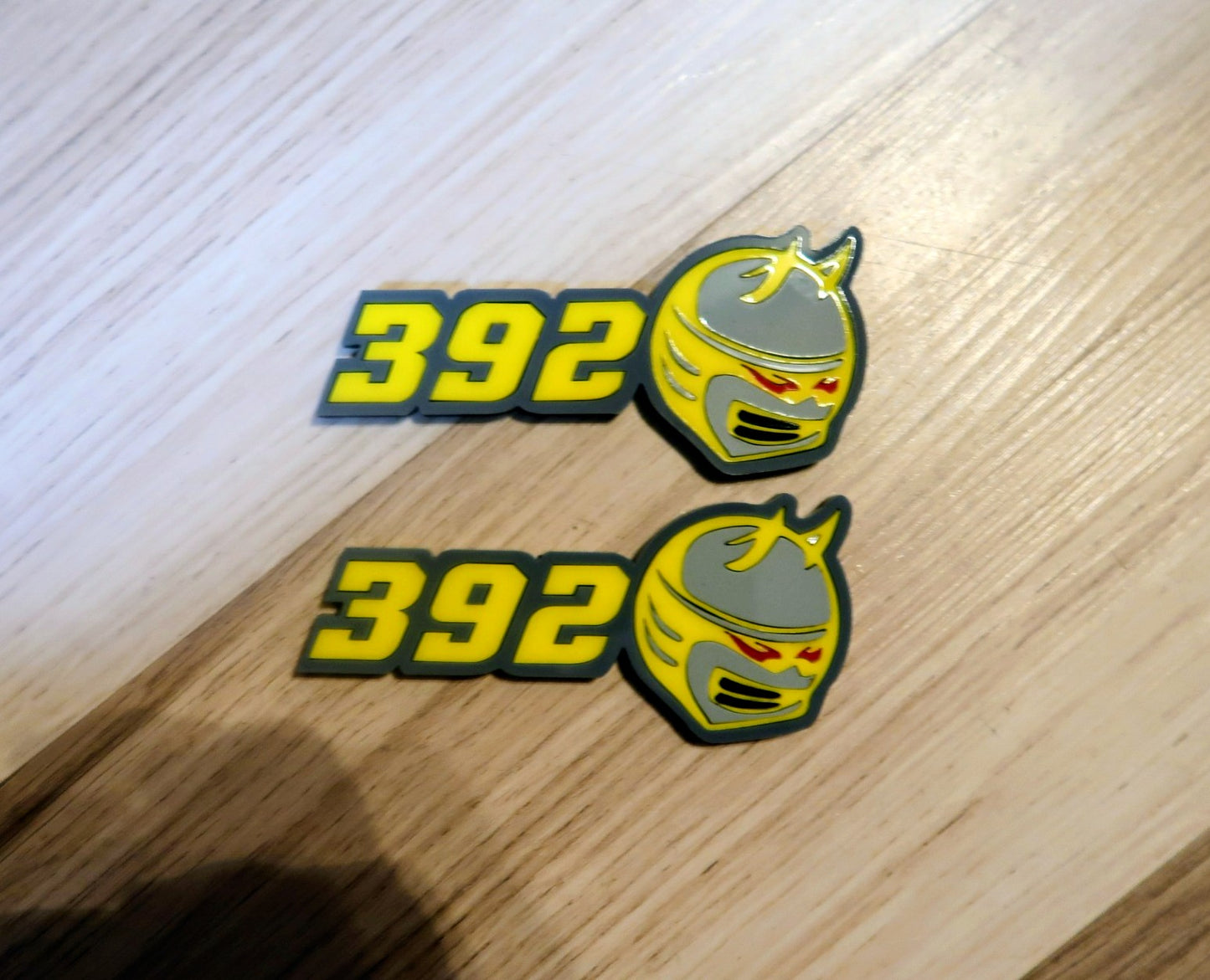 392,345 trunk/wing badge. Includes 2 badges.