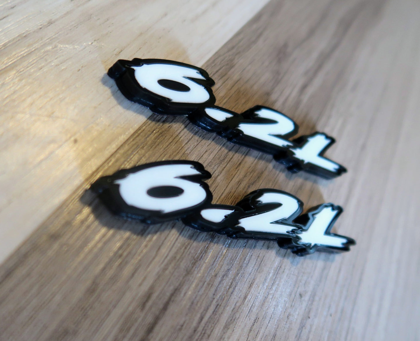 6.2L badges. Includes 2.