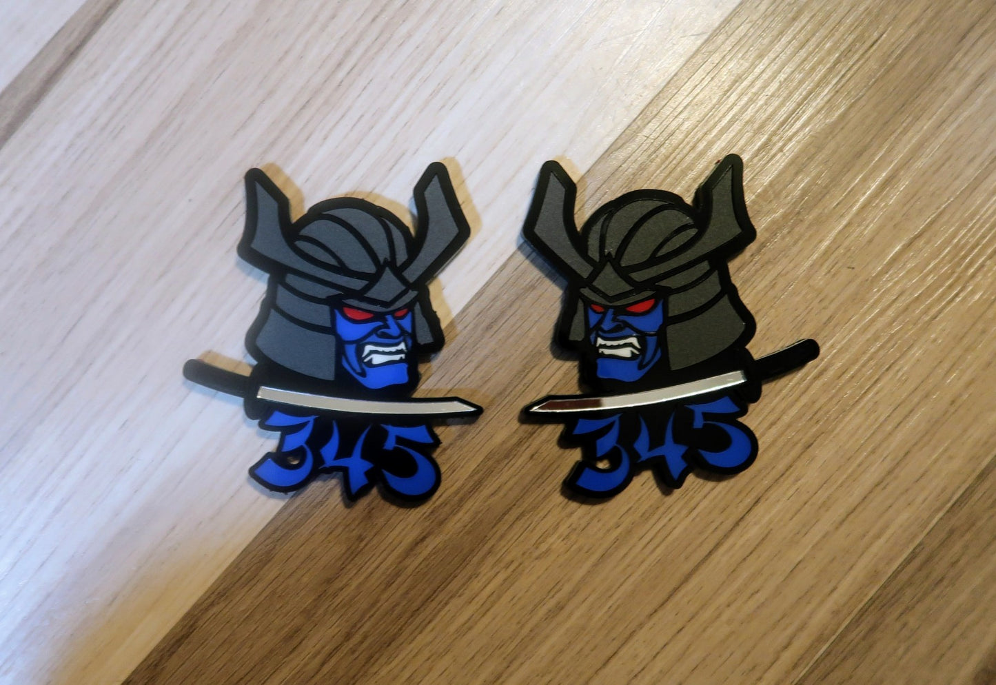 Samurai 345,392, 426 fender badges. Includes 2.