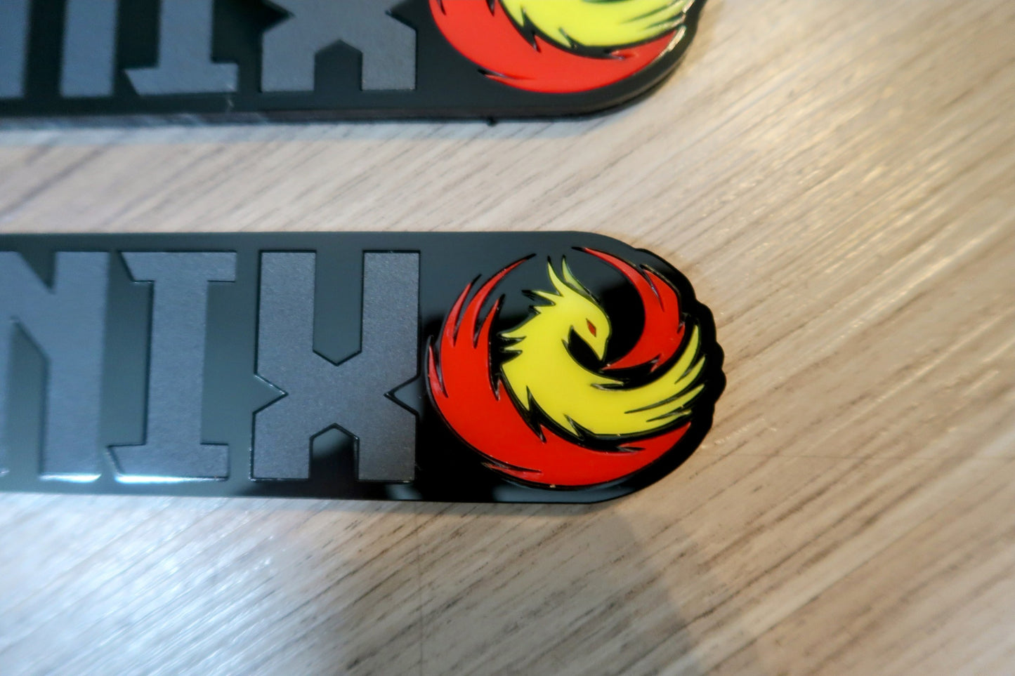 Phoenix badges. Includes 2