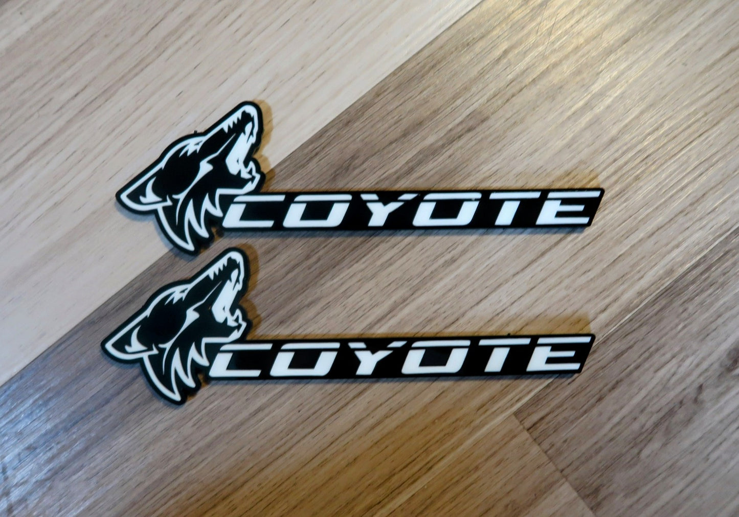 Coyote badges. Includes 2.