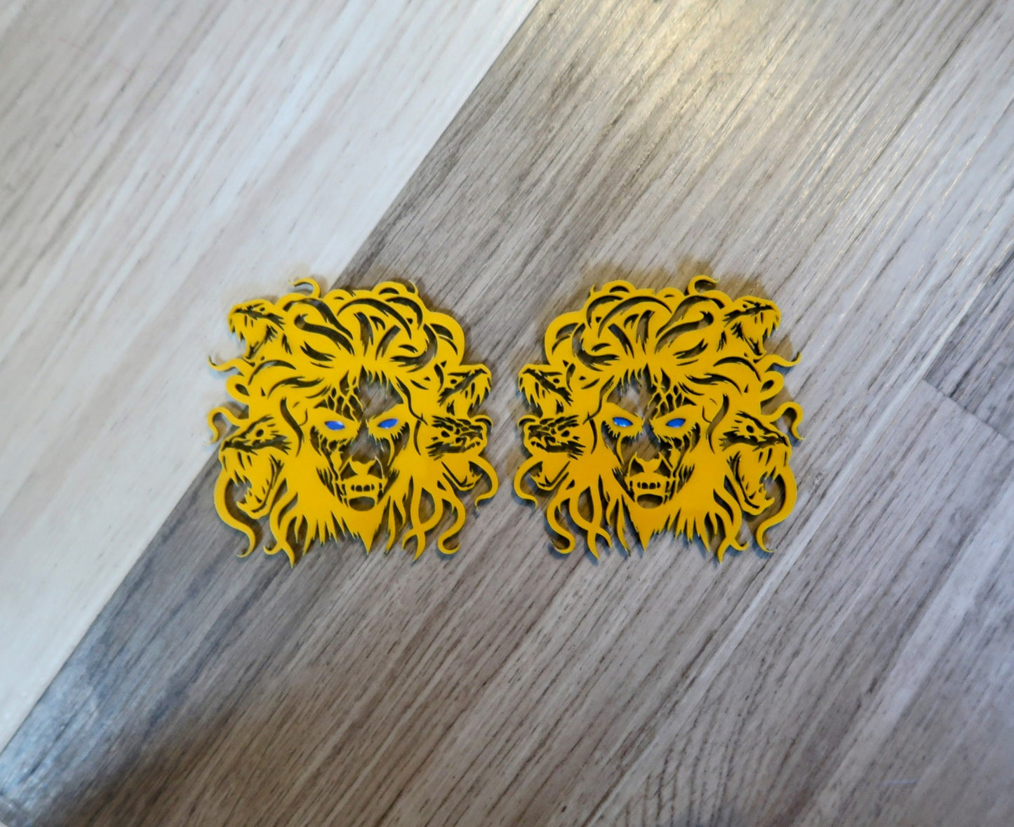 Medusa fender badges. Includes 2.