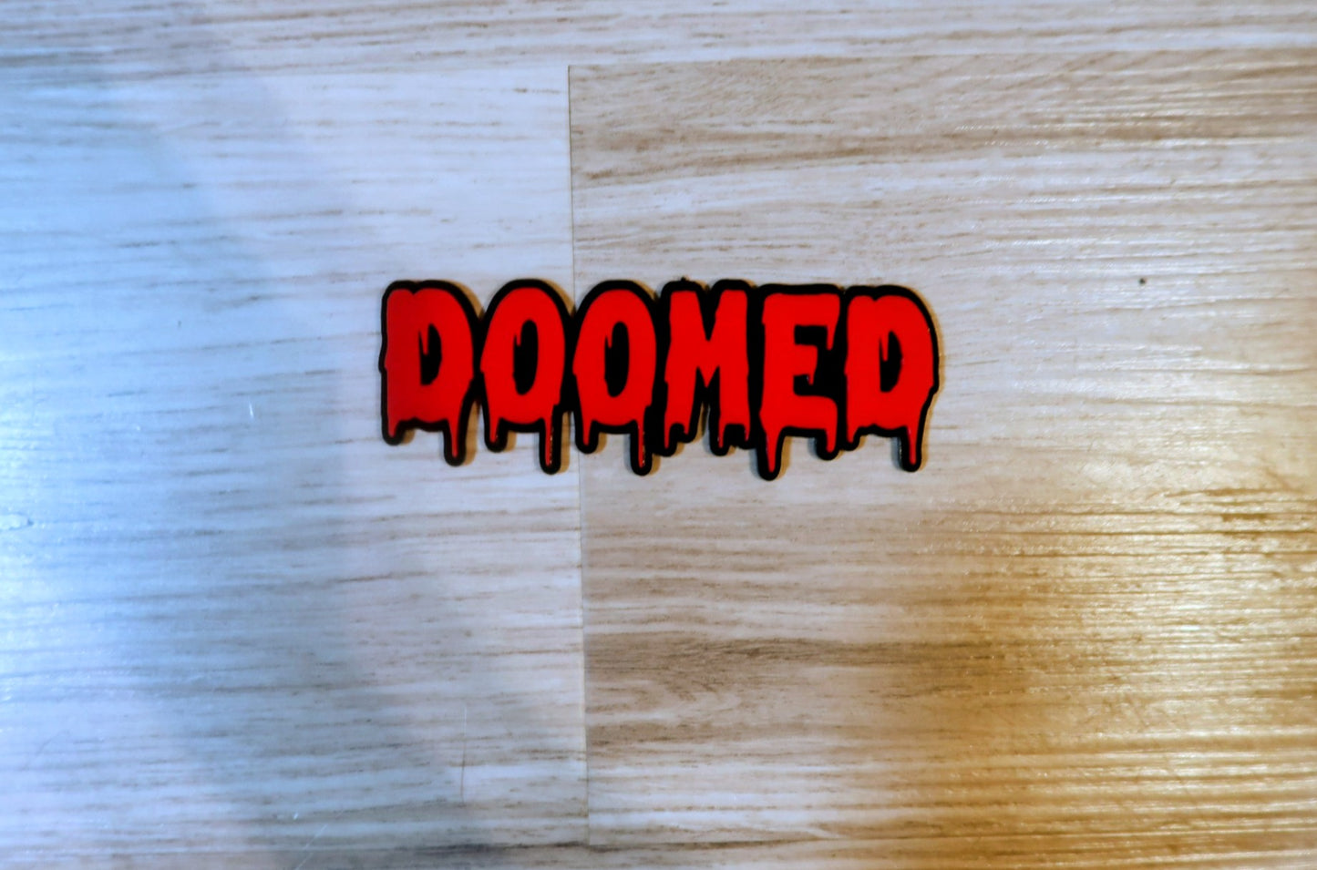 DOOMED Badge. Includes 1