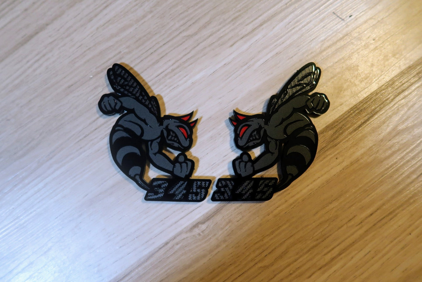 Devil 392, 345, or 426 fender badges. Includes 2.