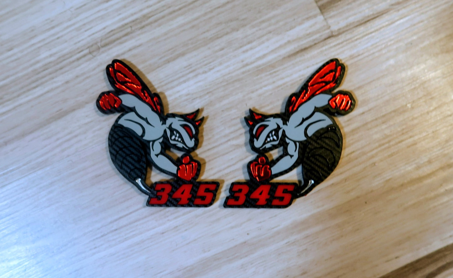 Devil 392, 345, or 426 fender badges. Includes 2.