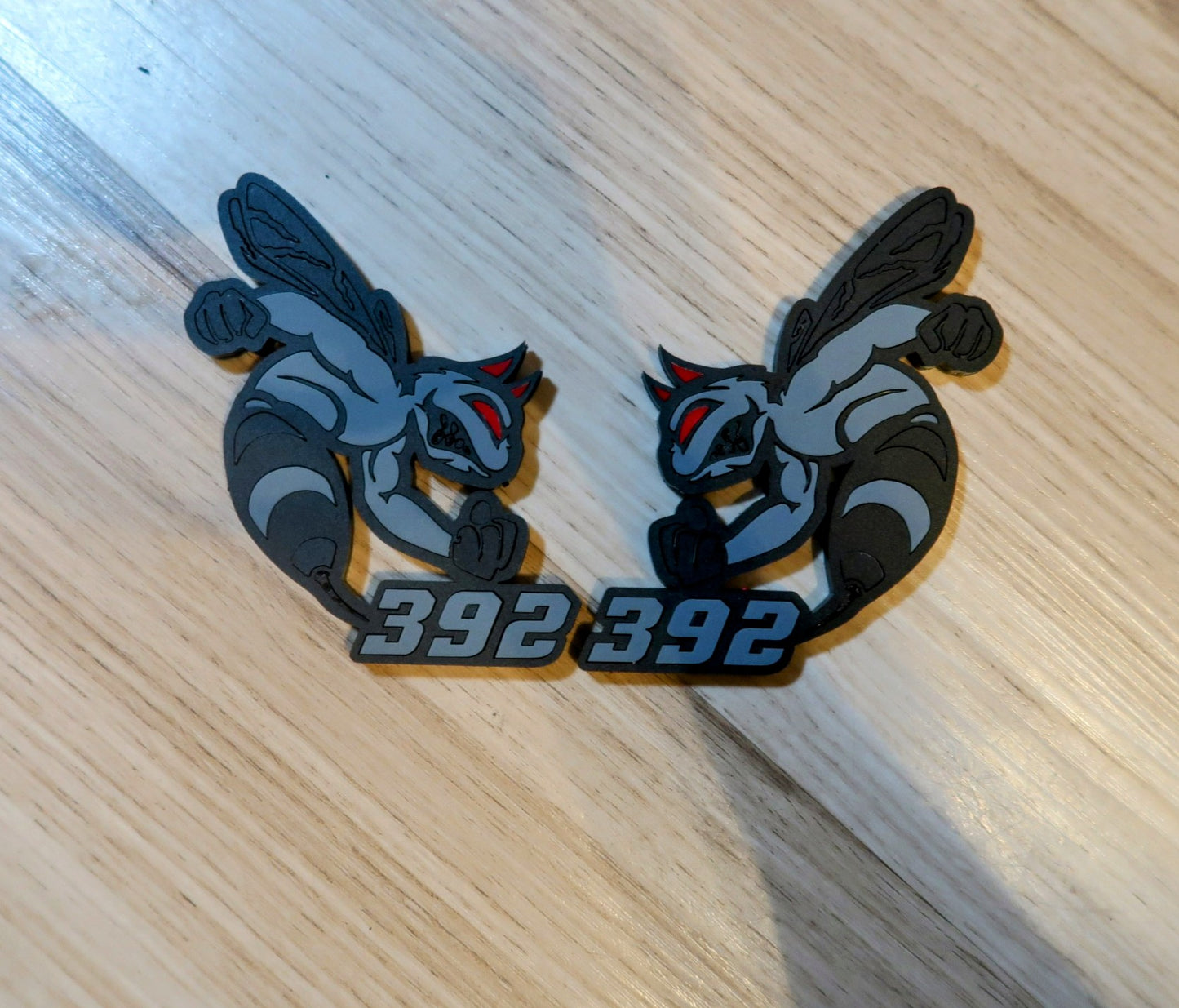 Devil 392, 345, or 426 fender badges. Includes 2.