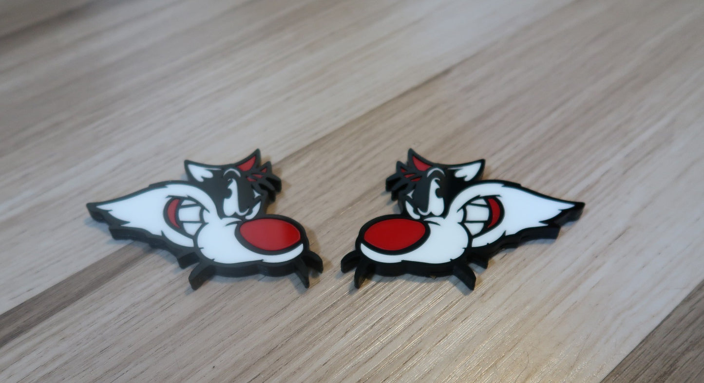 Sylvester Custom badges. Includes 2.