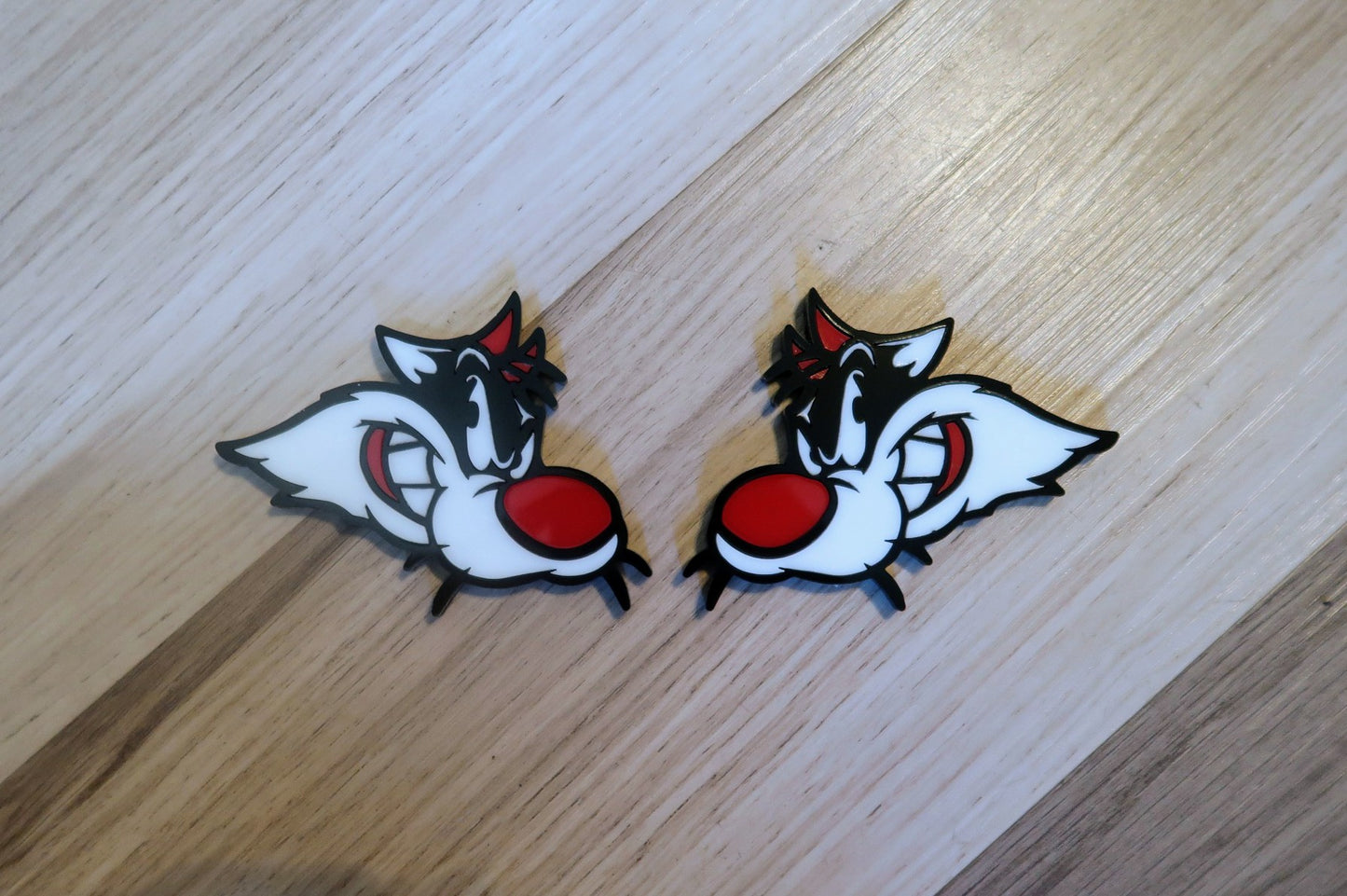 Sylvester Custom badges. Includes 2.