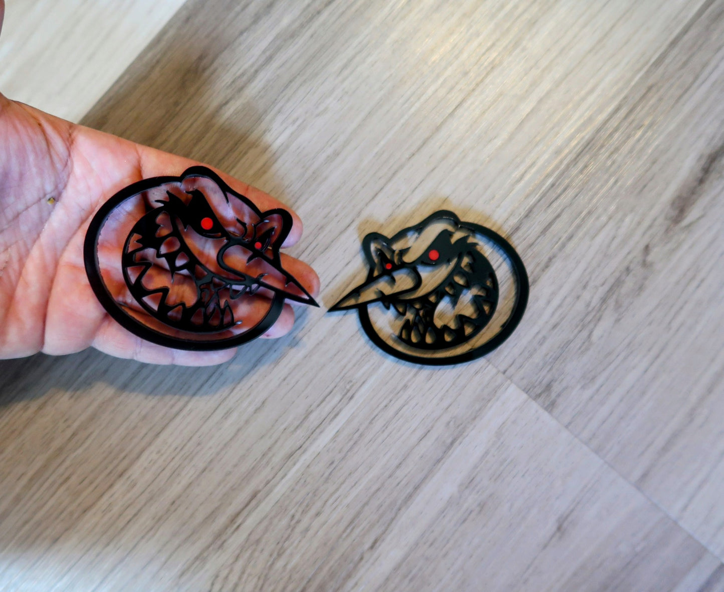 Possessed Snowman badges. Includes 2
