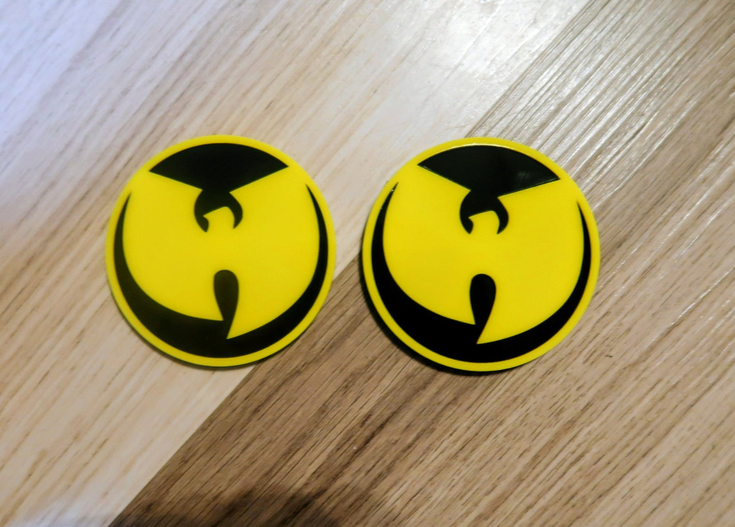 Inspired Wu Tang badges. Includes 2.