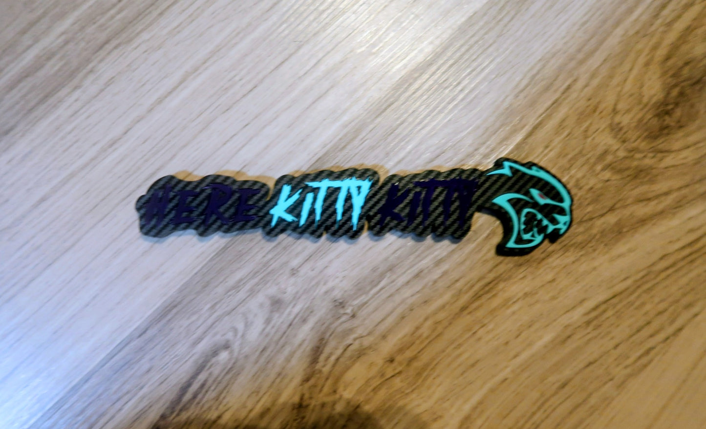 Here Kitty Kitty car badge