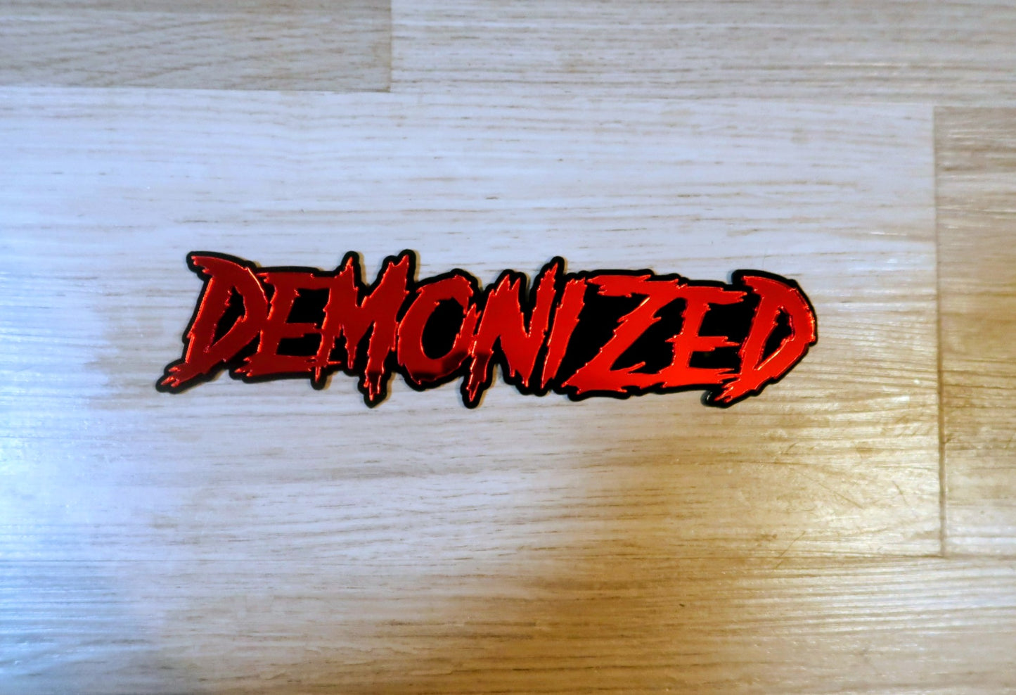 Demonized Car Badge
