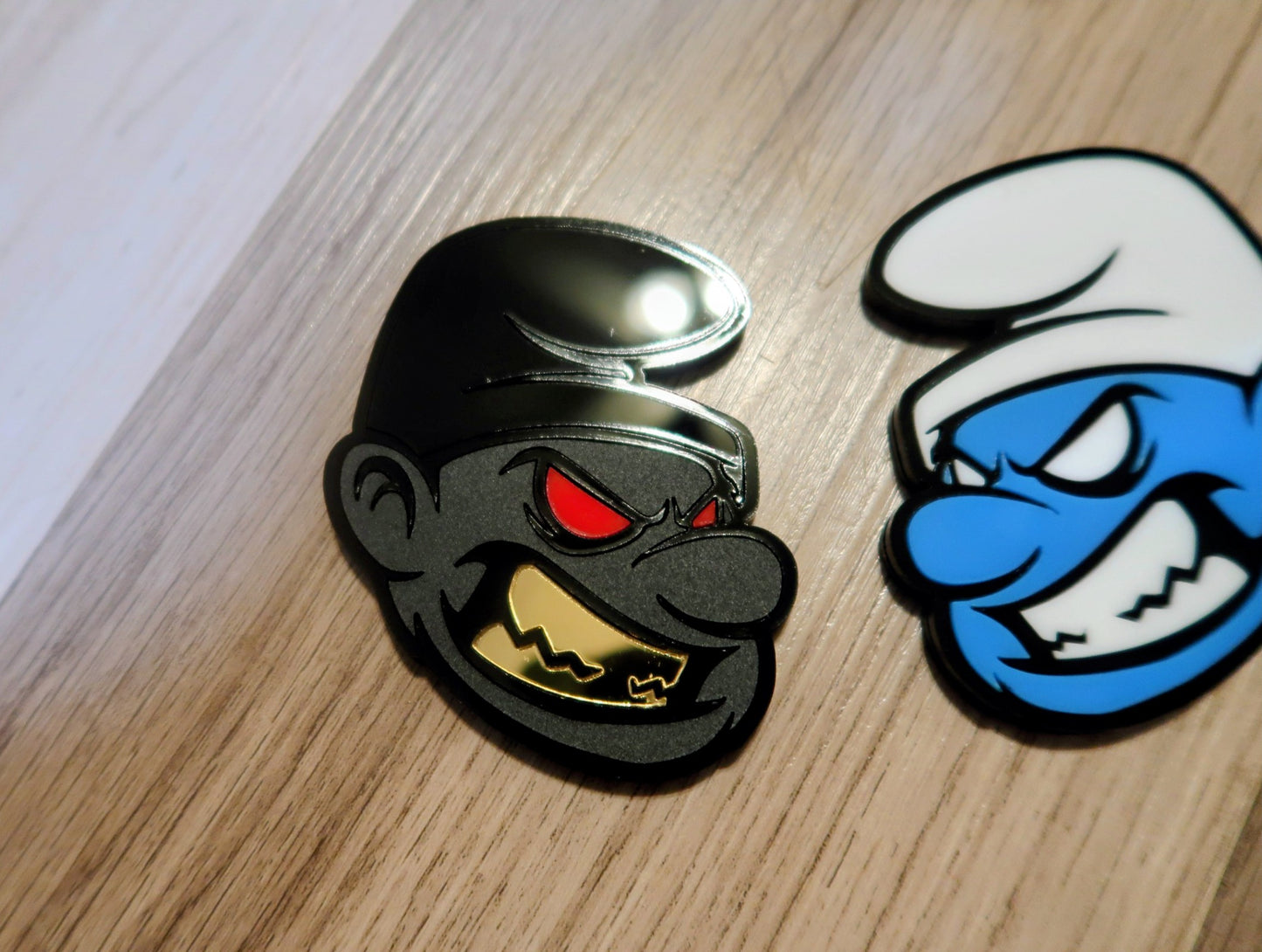 Possessed Smurf badges. Includes 2