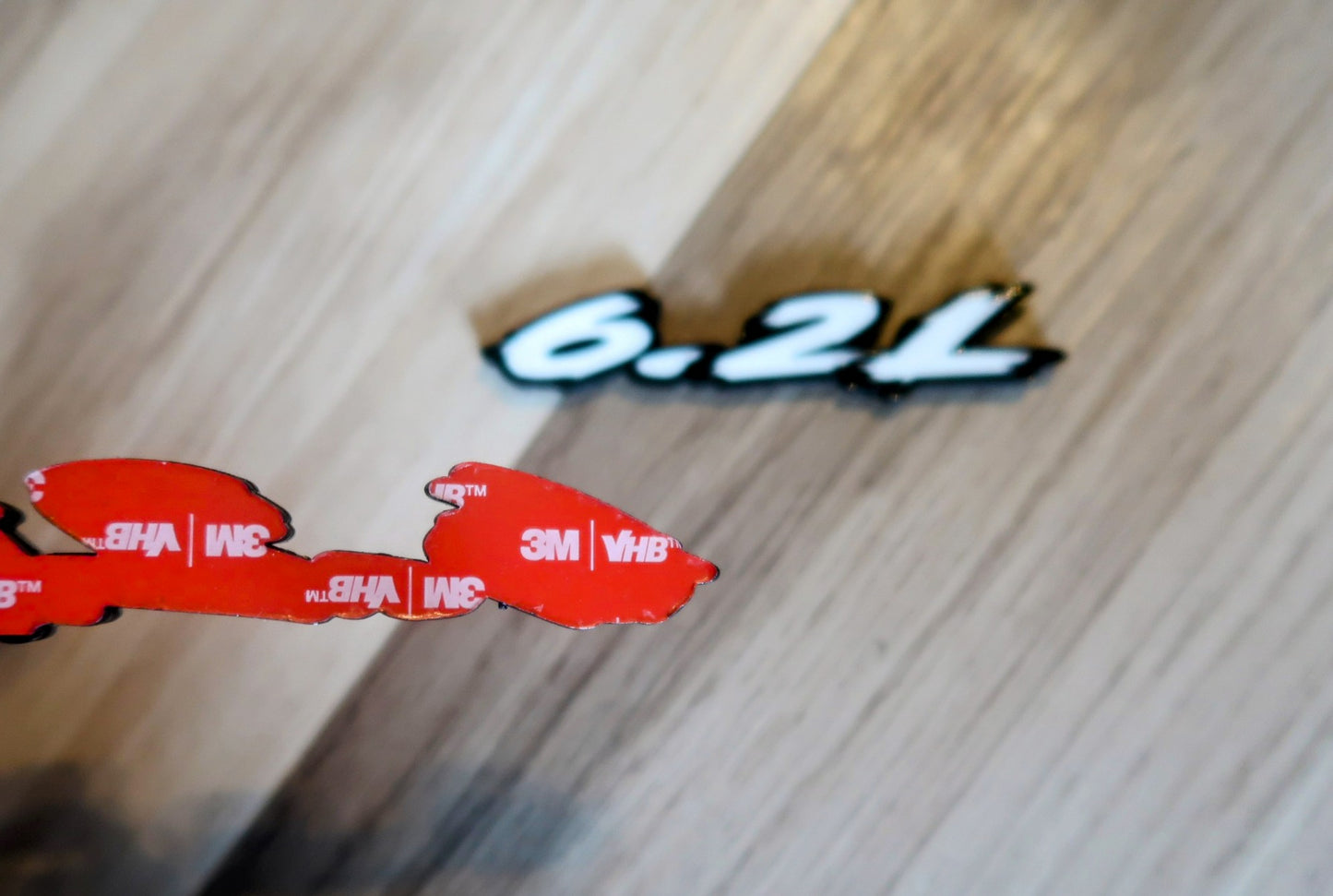 6.2L badges. Includes 2.