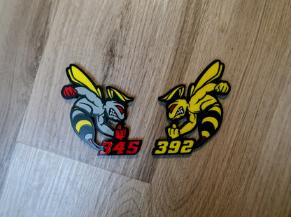 392 or 345 fender badges. Includes 2.