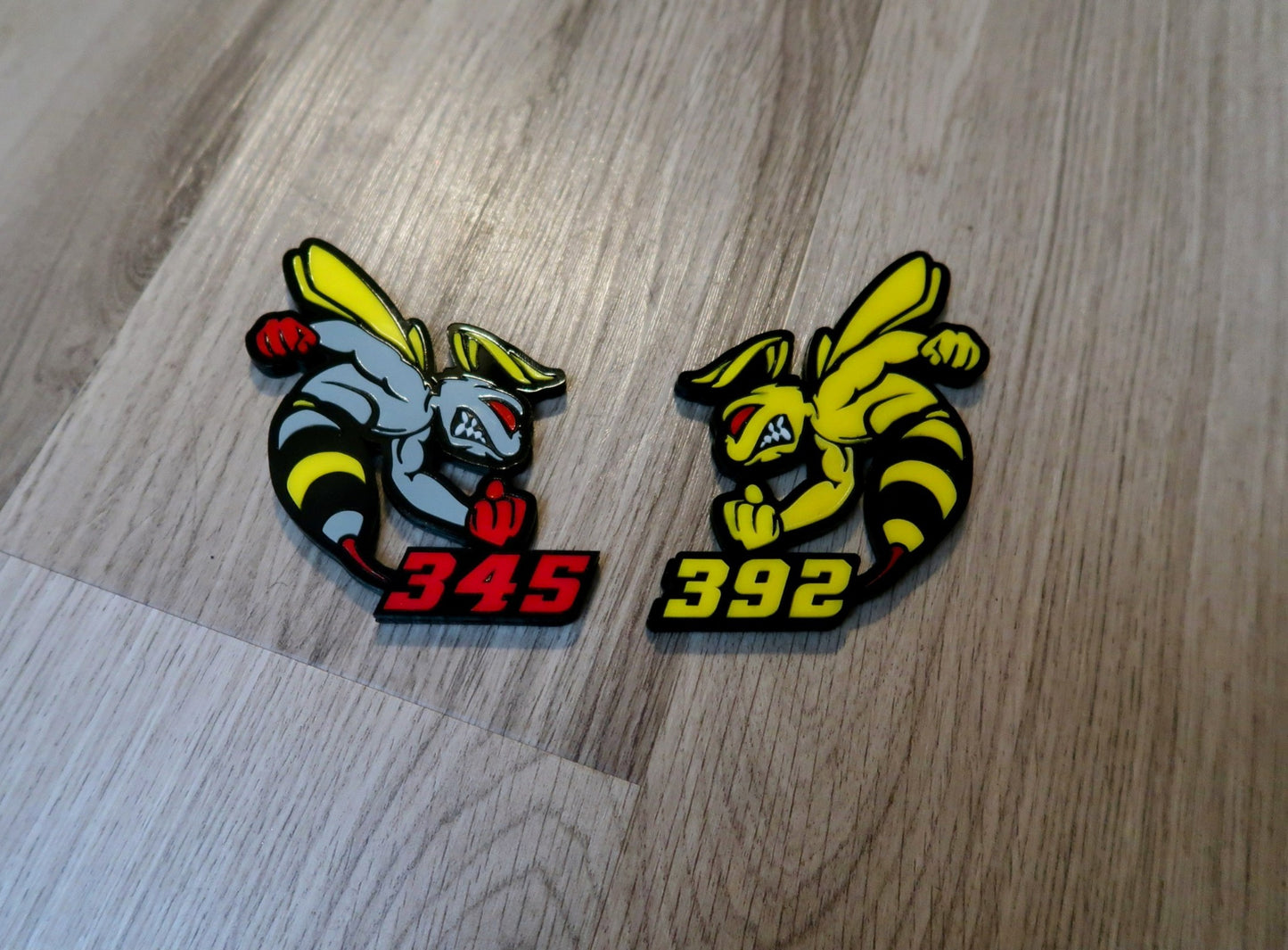 392 or 345 fender badges. Includes 2.