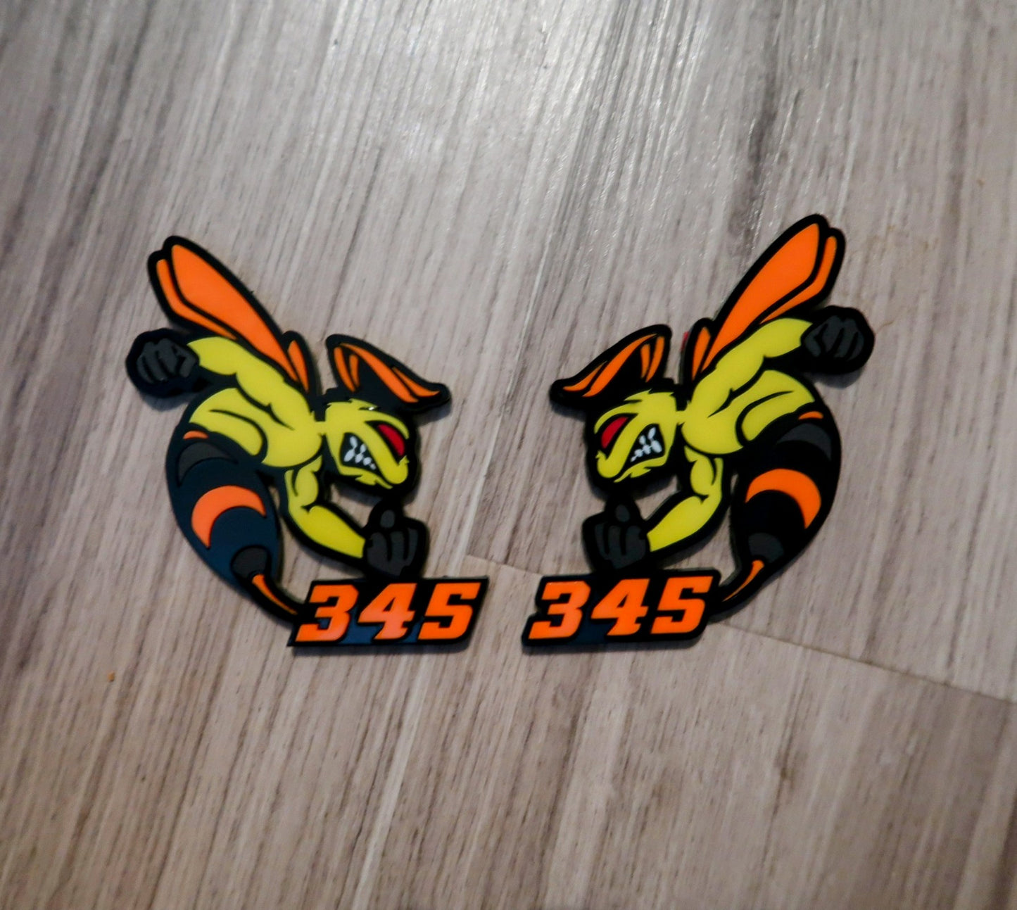 392 or 345 fender badges. Includes 2.