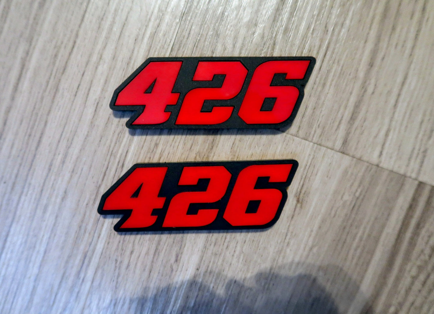 392, or 345, or 426 fender badges. Includes 2.