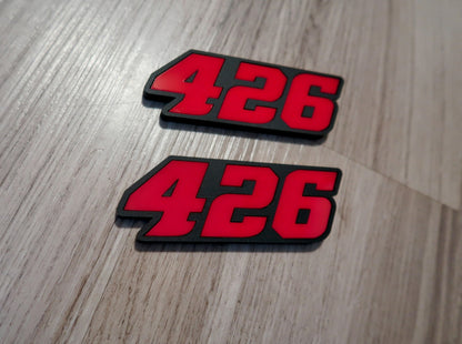 392, or 345, or 426 fender badges. Includes 2.