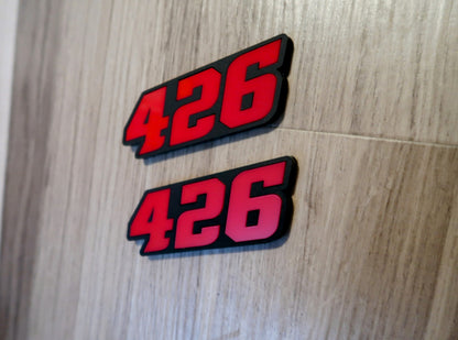 392, or 345, or 426 fender badges. Includes 2.