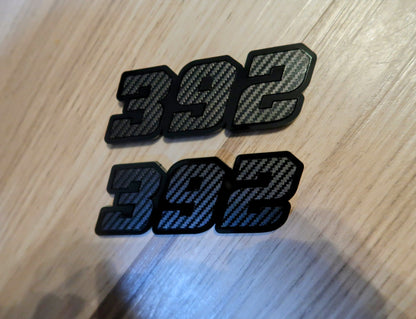 392, or 345, or 426 fender badges. Includes 2.