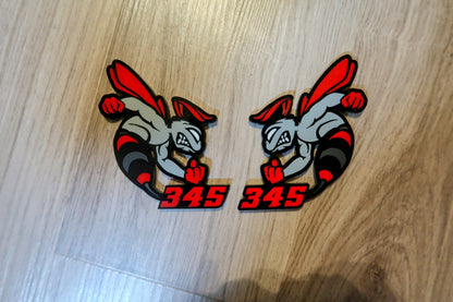 392 or 345 fender badges. Includes 2.