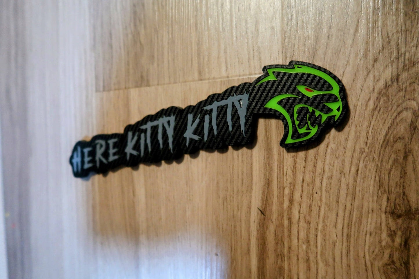 Here Kitty Kitty car badge