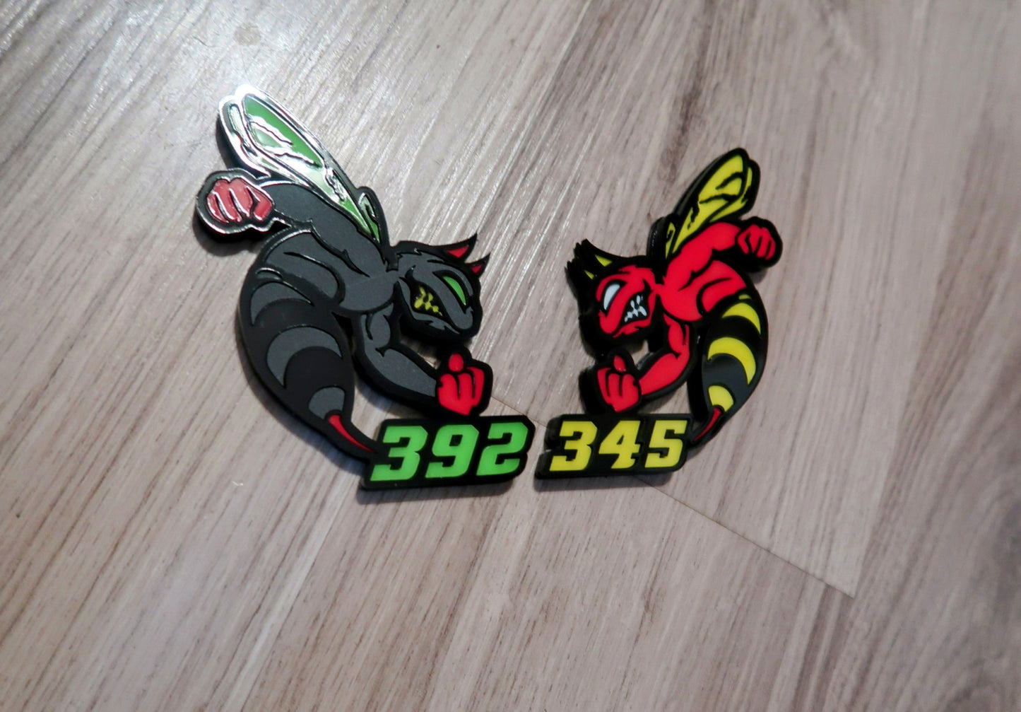 Devil 392, 345, or 426 fender badges. Includes 2.