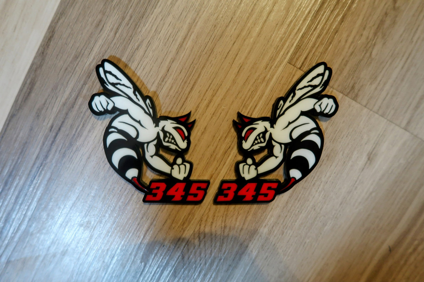 Devil 392, 345, or 426 fender badges. Includes 2.