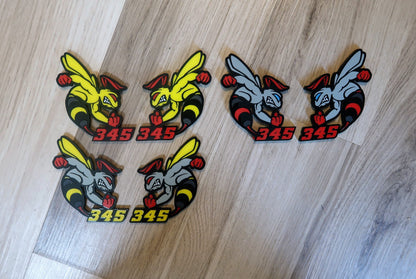 392 or 345 fender badges. Includes 2.