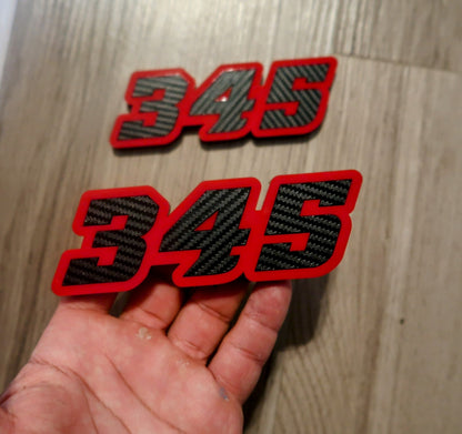 392, or 345, or 426 fender badges. Includes 2.