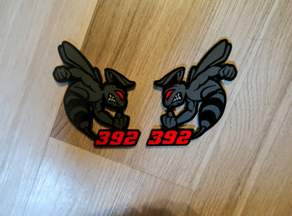 392 or 345 fender badges. Includes 2.